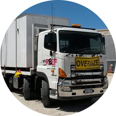 Reef Group's Hiab Truck transporting a load in Bunbury.