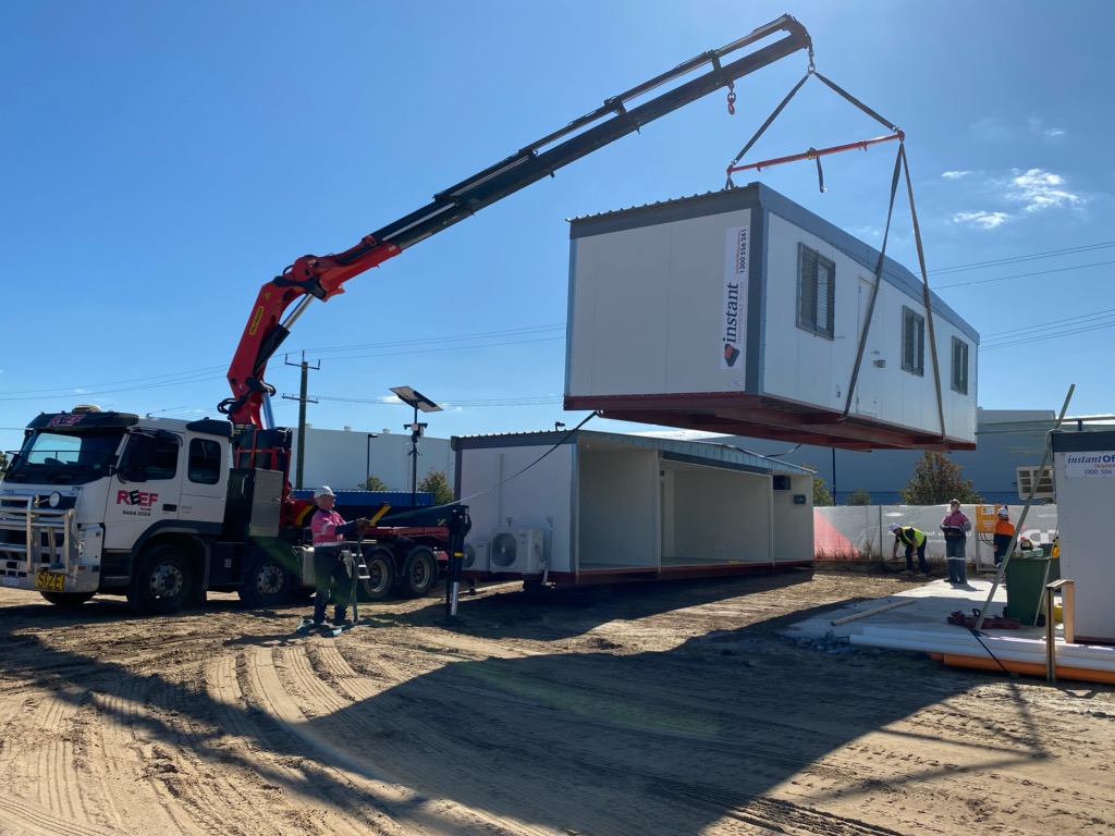 Reef Group's Hiab Crane in Bunbury lifting a load and preparing for Transport.