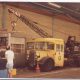 vintage photo of a hiab crane transporting items in the 80s
